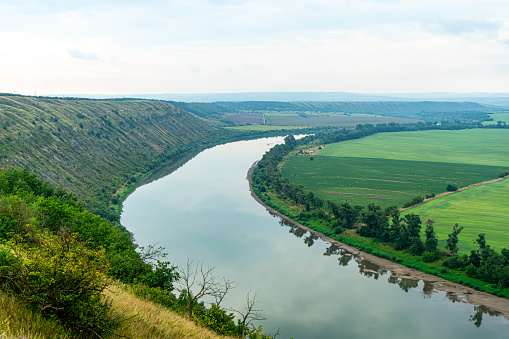 Landscape with canyon, forest and a river in front. Dniester River. Ukraine
