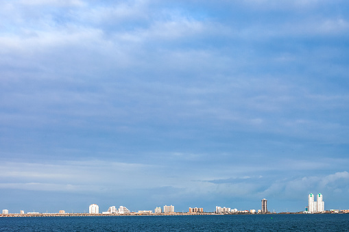 View to South Padre Island skyline from Port Isabel. Texas, USA