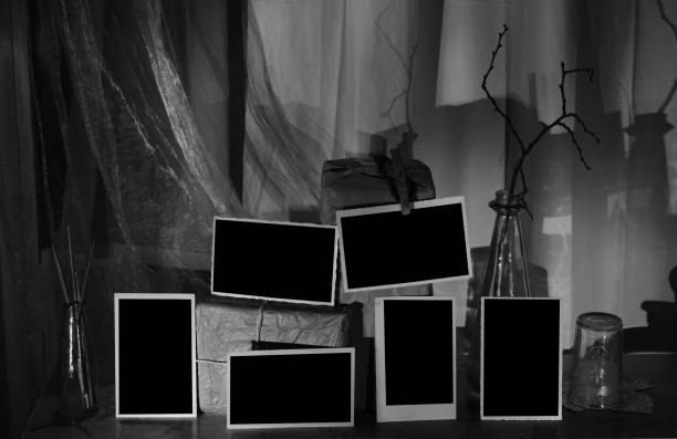 old empty photo frames, vintage photo prints, free pics space, black and white image