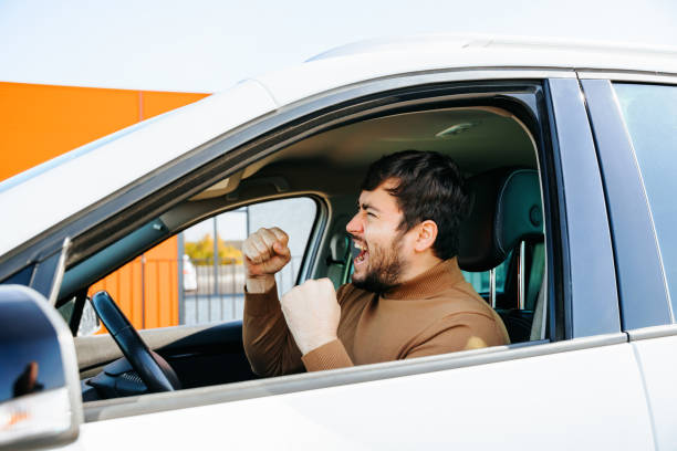 istock caucasian young bearded driver is crazy and shout angry. 2147640538