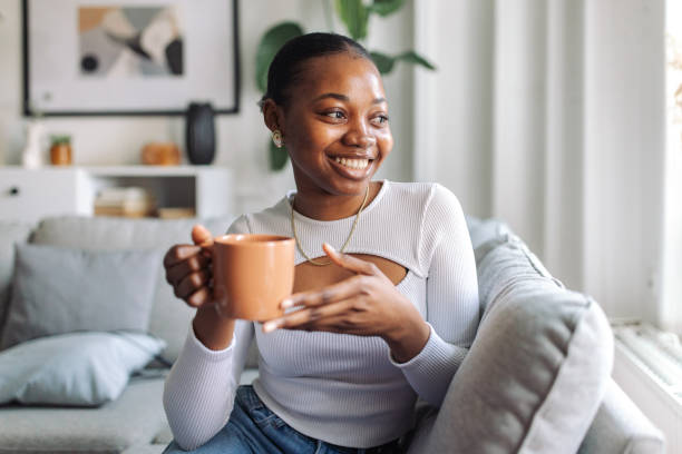 istock Radiant smile and relaxing tea time at home 2147641722