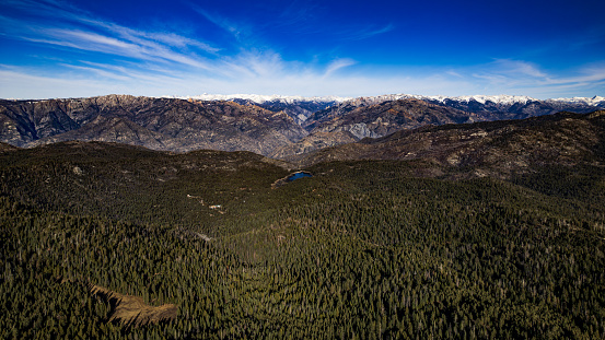 Approximately 800 feet above ground level and over looking Hume Lake in Sequoia National Forest. Shot with a DJI Mavic Air 2S drone