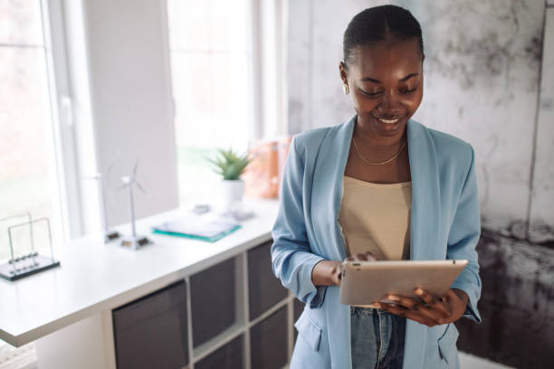 istock Professional african american woman using tablet in office 2147644998
