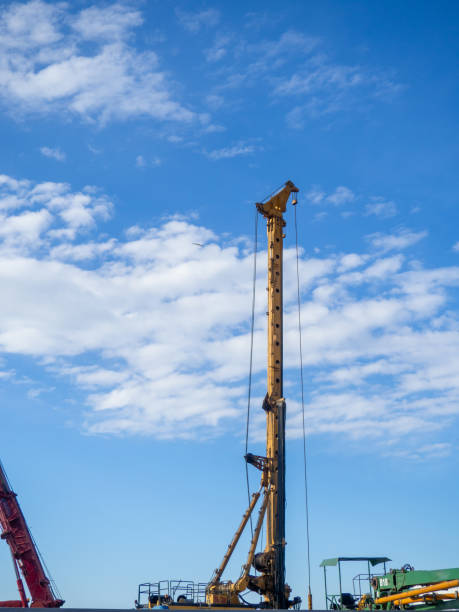 istock Builders at home construction. Crane and construction of new floors 2147645034