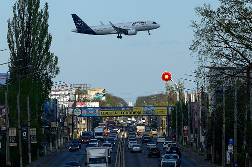 Otopeni, Romania. 8th Apr, 2024: Lufthansa flight Frankfurt to Bucharest, LH1418, lands at Bucharest Henri Coanda International Airport (AIHCB), over the National Road no. 1 in Otopeni, 16.5 km north of Bucharest.