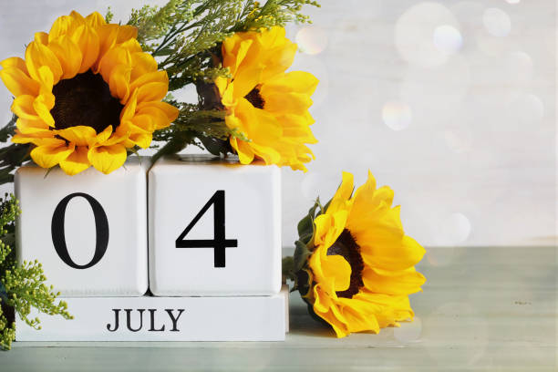 istock July 4th Calendar Blocks with Beautiful Sunflowers 2147646563