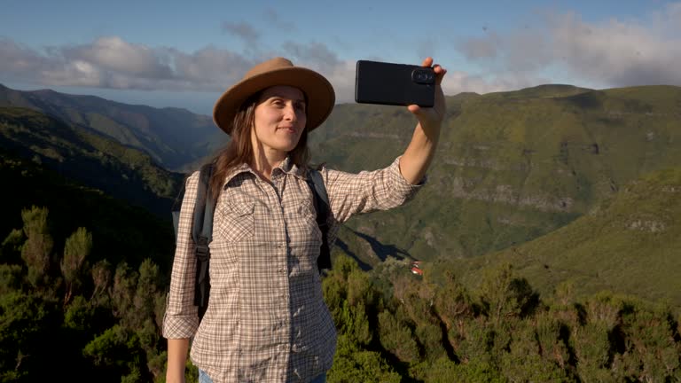 Solo Travel. Woman live streams from Madeira on vacation.