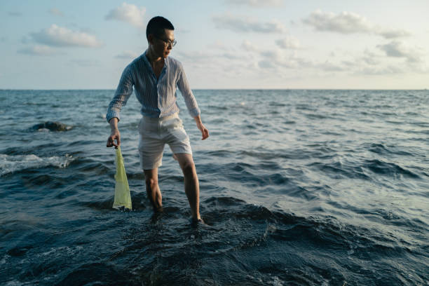 Cleaning Beach on Travel in Asia