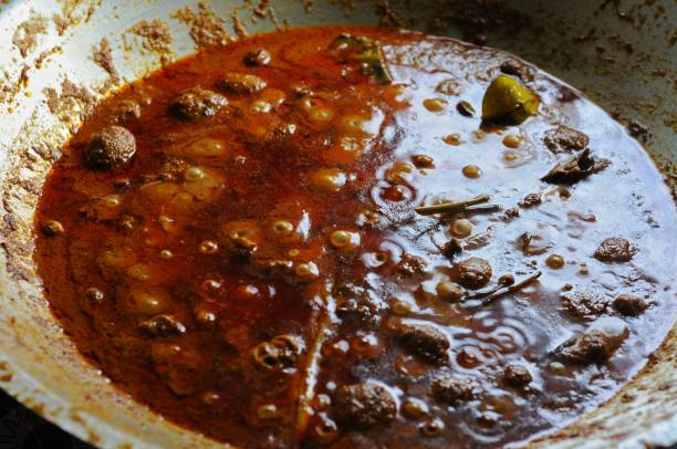 istock the process of cooking rendang typical of West Sumatra 2147651123