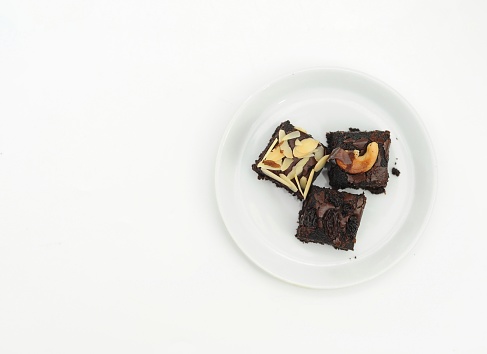 brownies on a white plate, phography food photo
