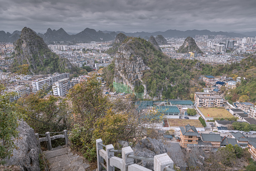 The stairs in the park in the Guilin city with the residential buildings around, Guilin, China