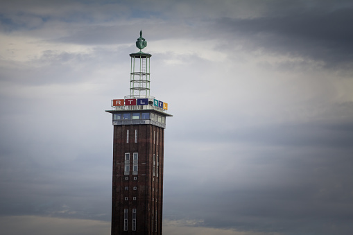 Cologne, Germany - November 6, 2022: Pictire of a tower of Rheinhalle of Kolnmesse with the logo of RTL deutschland which has its headquarters over there, in Cologne, Germany.
