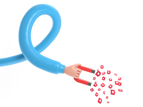 Human hand holding magnet with pin hearts. Concept of concept of attracting an audience. SMM metaphor, revealing the concept of followers.long arms concept.