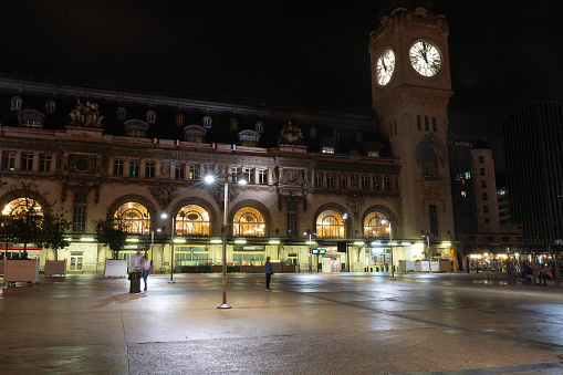 Facade of Paris-Lyon station at night on a summer day. Paris. France. August 11, 2023