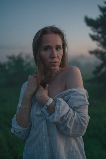 istock Woman in a field with fog 2147676647