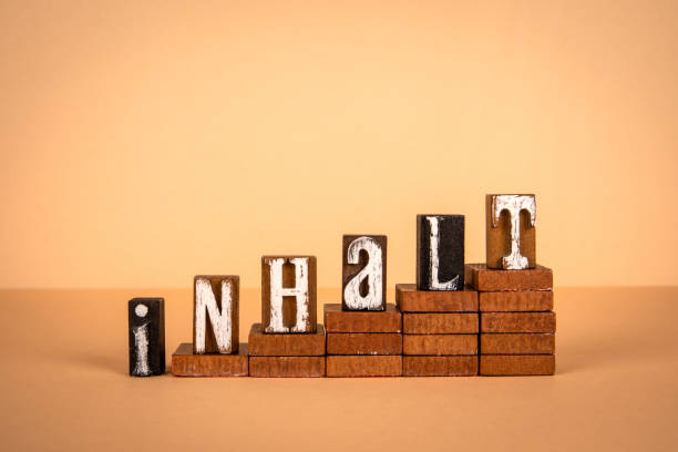 istock Content word in German. Wooden alphabet letters on a light background 2147677182