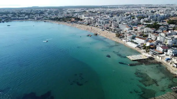 Altinkum is a neighborhood in Didim district of Aydin province. It has a population of 5.516. It is a seaside resort on the Aegean Sea, 123 km from Aydın. It is close to the ancient Temple of Apollo and the ruins of the Ionian city of Didyma.