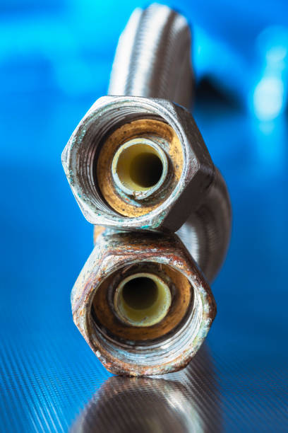 istock Old braided stainless steel water hose 2147677688