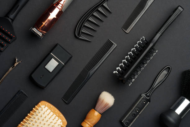 istock Variety of Hair Styling Tools and Accessories Displayed on a Dark Background 2147678242
