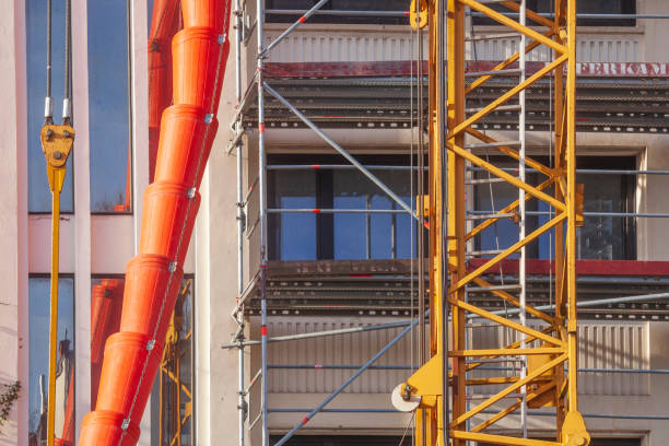 istock Scaffolding with construction crane and downpipe on a renovated old building, Bremen, Germany 2147678287