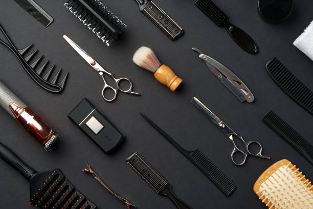 istock Variety of Hair Styling Tools and Accessories Displayed on a Dark Background 2147678454