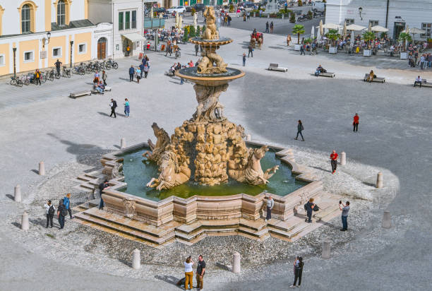 Salzburg, Austria -  October 5, 2022: The Horse fountain of Residence square, seen from the terrace of the Dom Quartier museum
