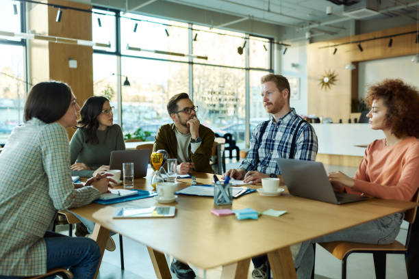 istock Young freelancers having a casual meeting in a modern office. 2147681731