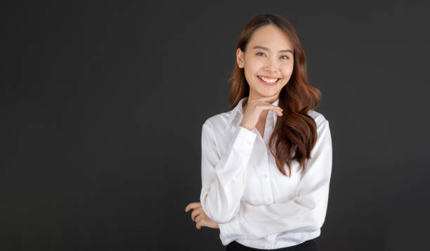 istock Business woman wearing white shirt Standing and doing various poses. 2147682536