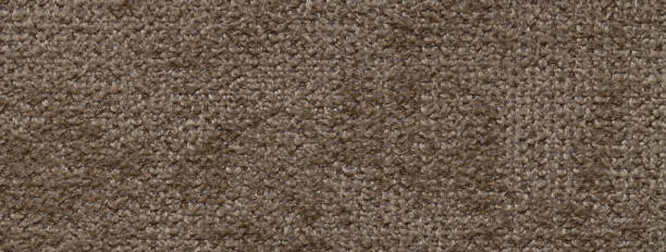 istock Texture of velvet dark brown background from upholstery textile material, macro. Abstract velour umber fabric 2147682621