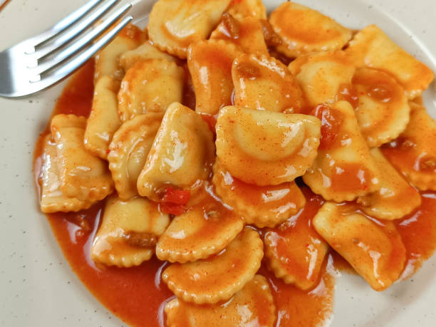 istock tomato ravioli, industrial product, on a plate 2147683797