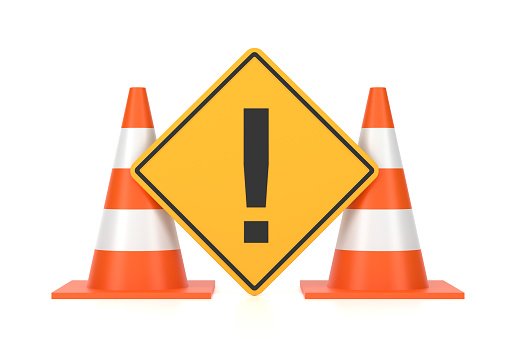 Traffic Cone And Exclamation Mark Sign On White Background