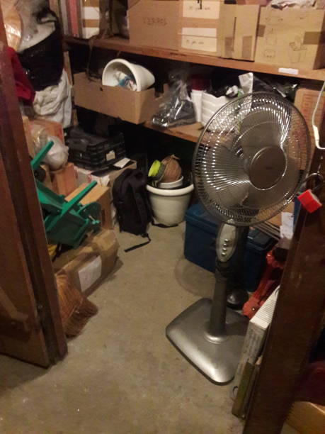 istock Storing belongings in a cellar, cardboard boxes 2147684214