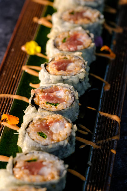 istock Delicious fried sushi with cream on tray 2147684548