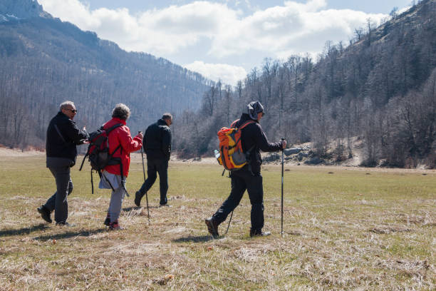 istock Elderly people walking on the mountain 2147685278