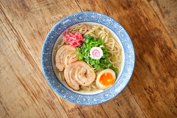 istock Delicious ramen soup with soft egg and pork meat in bowl 2147685543