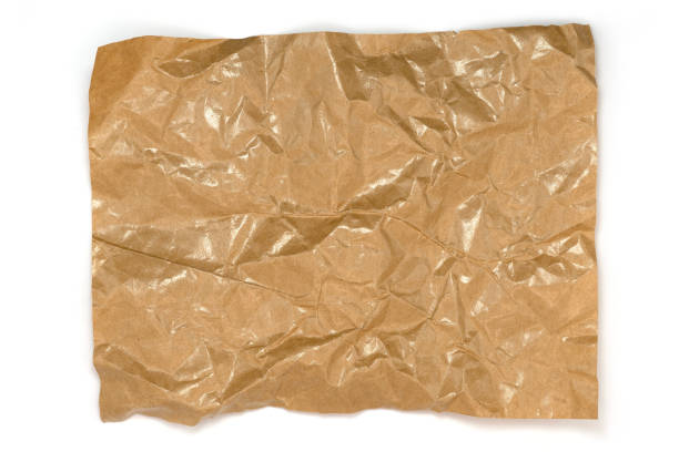 istock Brown crumpled paper isolated on white background 2147685654