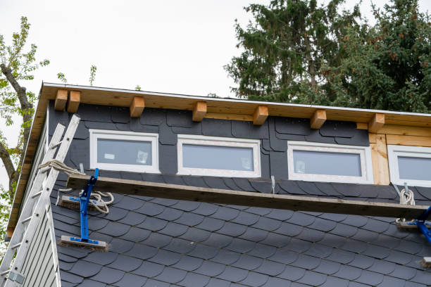 Architectural detail of the traditional slate facade, geometric pattern, gutter and wood elements, handcrafted surface