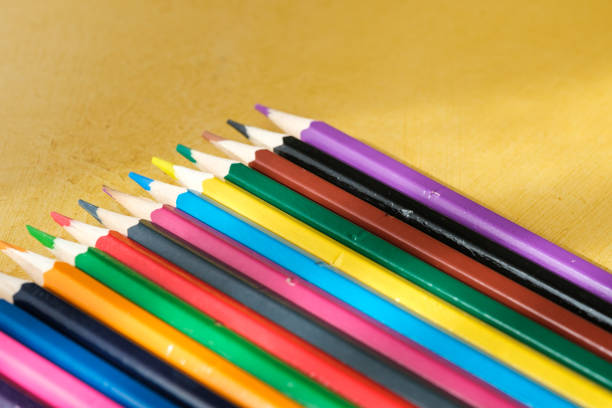 Color pencils arranged in wavey pattern