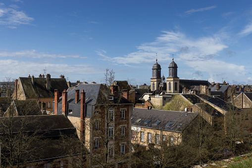 Aerial view of the cityscape of Sedan, in the Ardennes department of France. St.Charles church is visble on the skyline. Copy space above.