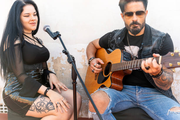 istock Guitarist and singer rehearsing their next songs 2147690071