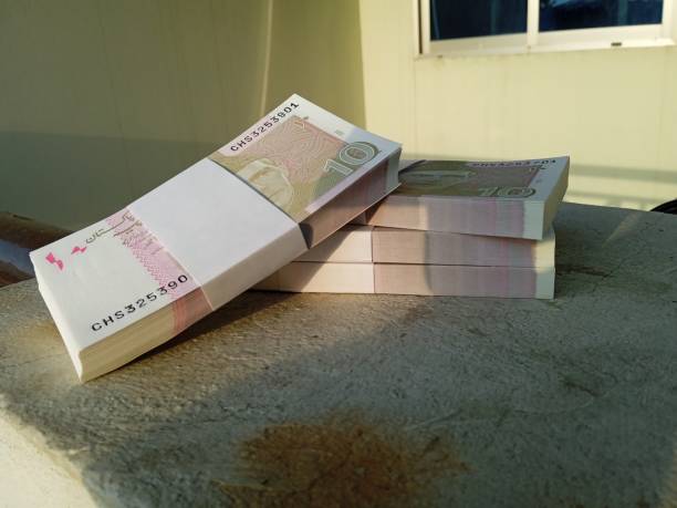 istock Bundle of Pakistani Currency. 10 Rupees note Pakistani, Pakistani currency note PKR 10 rupees. Heap of Pakistani currency bundle 2147690703