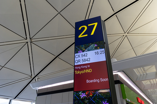 Hong Kong - March 28, 2024 : Departure gate for flight operated by Cathay Pacific to Tokyo International Airport / Haneda Airport at Hong Kong International Airport.