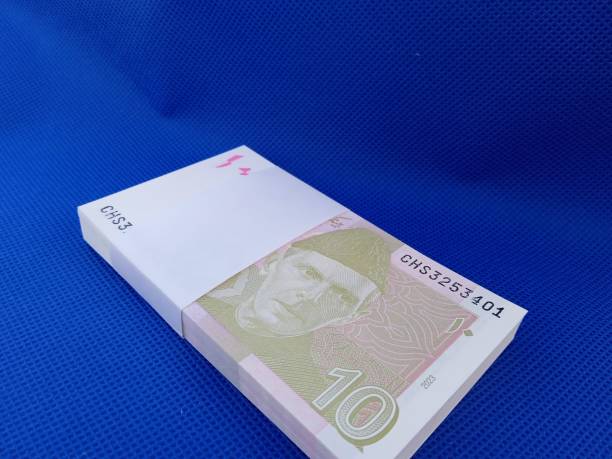 istock Bundle of Pakistani Currency. 10 Rupees note Pakistani, Pakistani currency note PKR 10 rupees. Heap of Pakistani currency bundle 2147691467