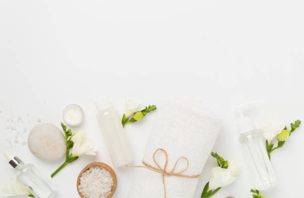 istock Flat lay with spa products and flowers on color background 2147692105