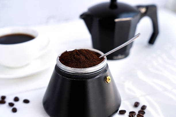 istock Freshly ground aromatic coffee in a geyser coffee maker on the table. Coffee for breakfast. Close-up. Selective focus. 2147692410