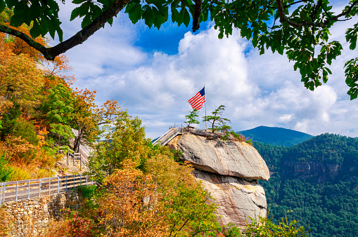 Chimney Rock, North Carolina, with a waving American flag