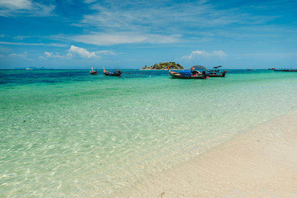 istock Beach and clear blue water in summer and vacation 2147693697