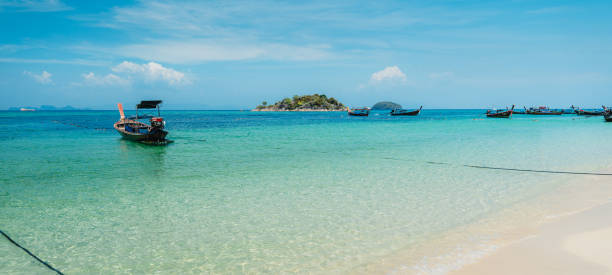 istock Beach and clear blue water in summer and vacation 2147693777