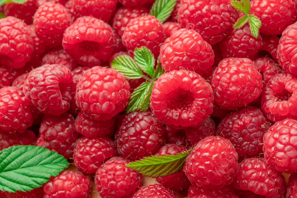 istock Fresh red ripe raspberries. Raspberries background. 2147693869