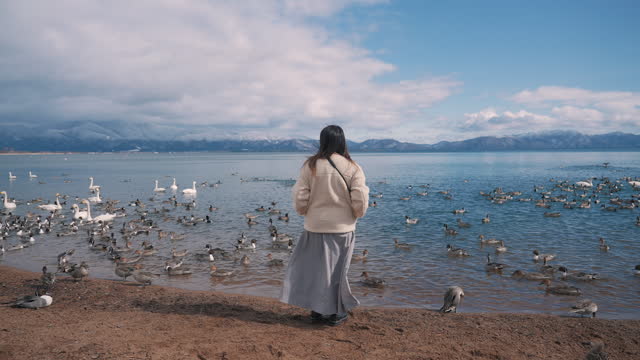 Tourist women travel at Inawashiro lake, Fukushima, Japan